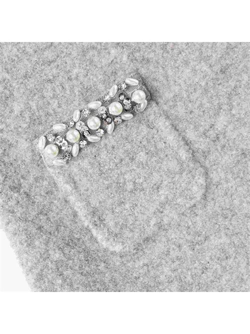 Gonna in Lana Morbida, accogliente e luminosa: i dettagli in strass e perle aggiungono accenti brillanti a questa gonna in maglia grigia. Abbinala a una t-shirt per le serate di gioco o indossala con il cardigan coordinato per un coordinato da far invidia.Fedele alle dimensioniIl tessuto è elasticoCintura elasticaTasche funzionali con finiture in perlineCardigan coordinato disponibile SELF PORTRAIT | AW25-720SK-GRGREY